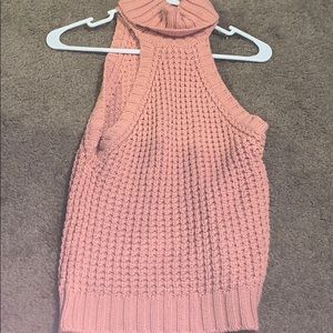 Sleeveless turtle neck sweater